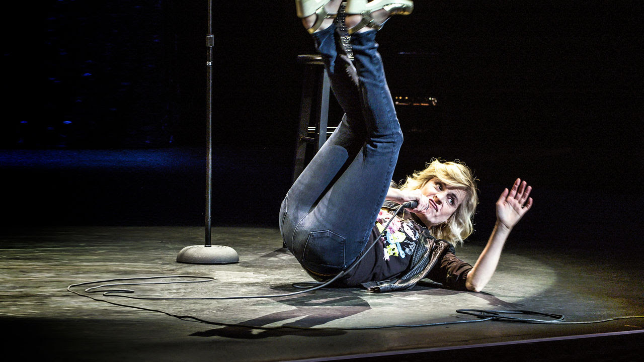 Maria Bamford performing on tour